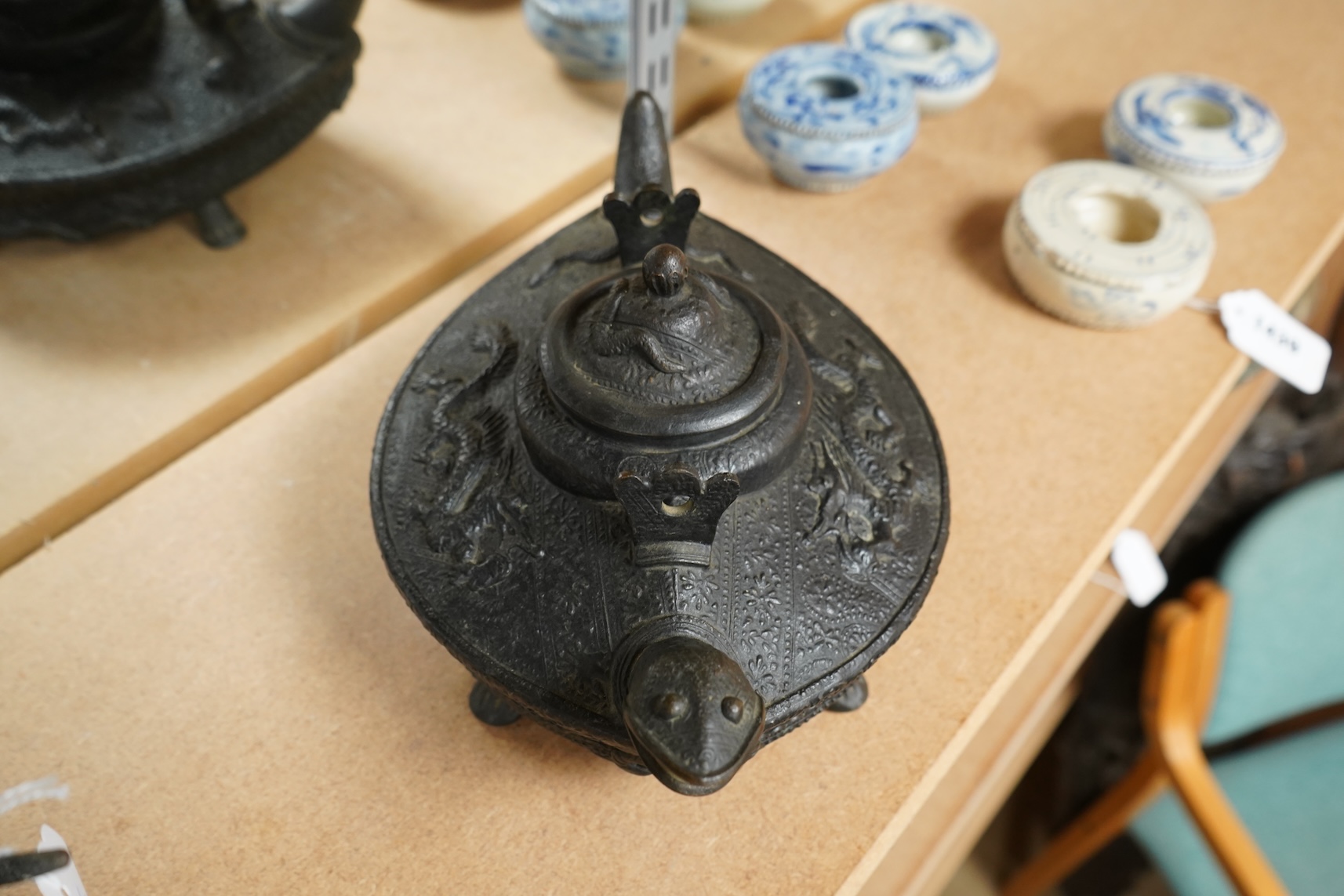 A Chinese cast bronze 'tortoise’ ritual tea kettle, 30cm long